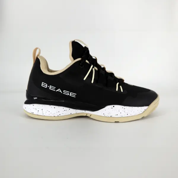 a black and tan basketball shoe